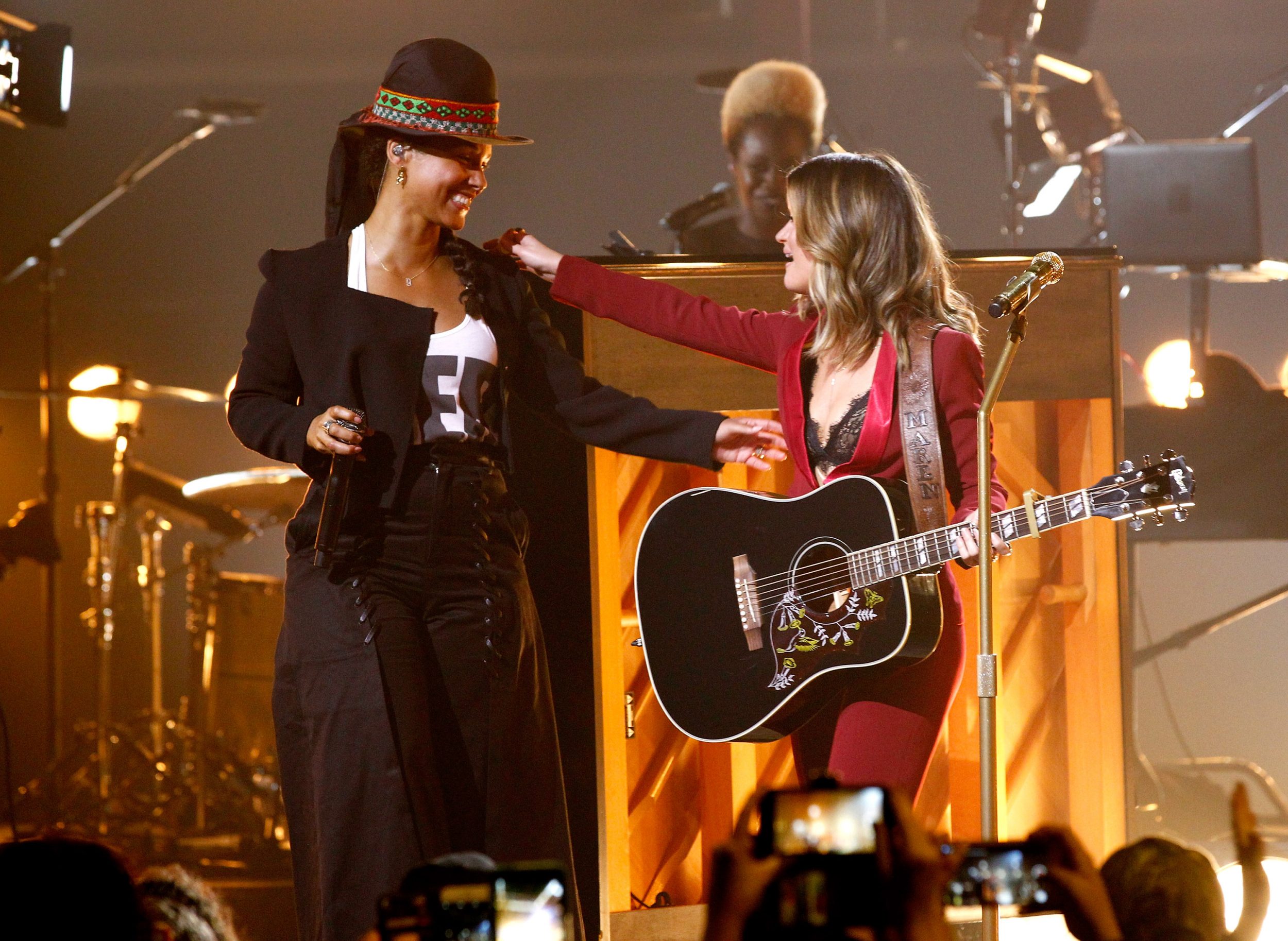 FRANKLIN, TN - AUGUST 31:  Singer-songwriters Alicia Keys (L) and Maren Morris perform onstage during CMT Crossroads: Alicia Keys and Maren Morris on August 31, 2016 in Nashville, Tennessee.  (Photo by Terry Wyatt/Getty Images for CMT)