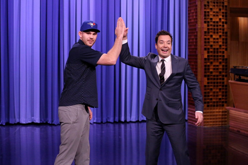 THE TONIGHT SHOW STARRING JIMMY FALLON -- Episode 0574 -- Pictured: (l-r) Toronto Blue Jays player Joe Biagini and host Jimmy Fallon high-five during the monologue on November 18, 2016 -- (Photo by: Andrew Lipovsky/NBC)