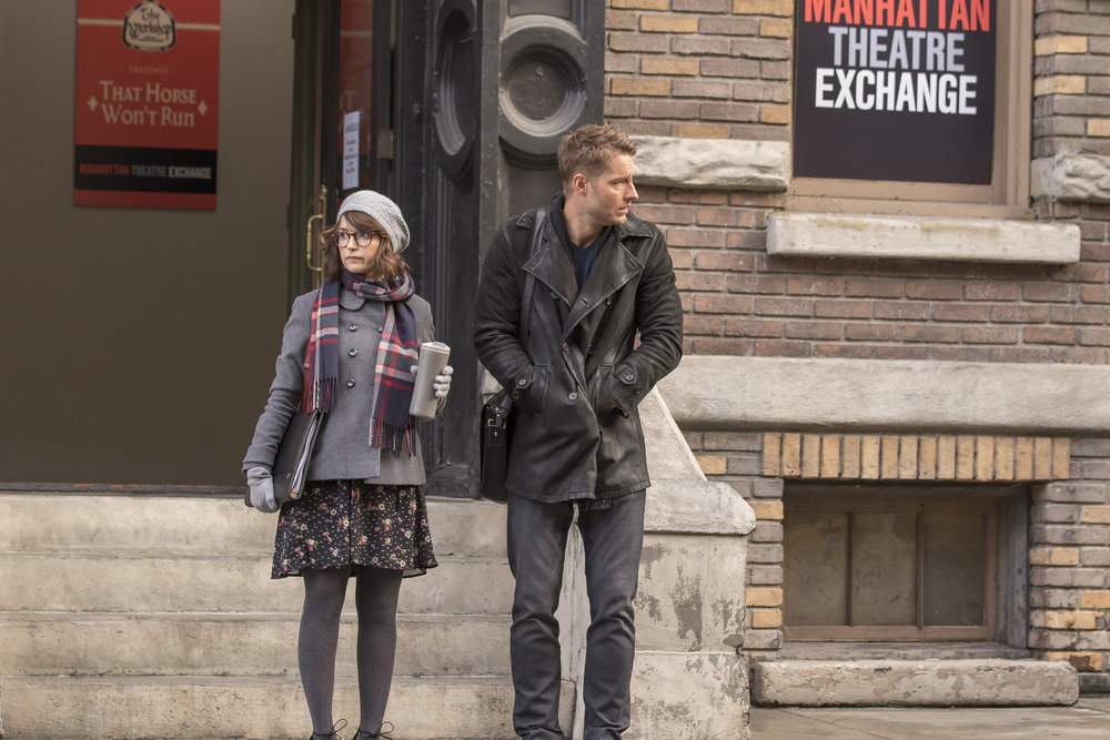 THIS IS US -- "Last Christmas" Episode 110 -- Pictured: (l-r) Milana Vayntrub as Sloane, Justin Hartley as Kevin --- (Photo by: Ron Batzdorff/NBC)