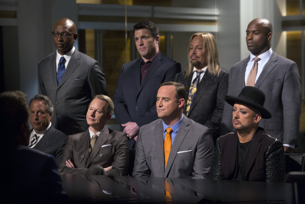 THE NEW CELEBRITY APPRENTICE -- "In Here You Call Me Governor" Episode 1501 -- Pictured: (clockwise) Eric Dickerson, Chael Sonnen, Vince Neil, Ricky Williams, John Lovitz, Carson Kressley, Matt Iseman, Boy George -- (Photo by: Luis Trinh/NBC)