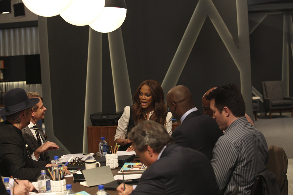 THE NEW CELEBRITY APPRENTICE -- "In Here You Call Me Governor" Episode 1501 -- Pictured: (l-r) Boy George, Carson Kressley, Tyra Banks, Eric Dickerson, Ricky Williams, Chael Sonnen, John Lovitz -- (Photo by: Luis Trinh/NBC)