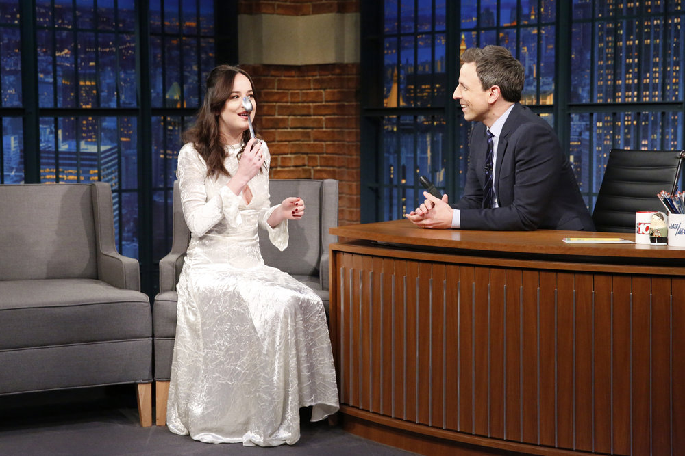 LATE NIGHT WITH SETH MEYERS -- Episode 482 -- Pictured: (l-r) Actress Dakota Johnson during an interview with host Seth Meyers on February 1, 2017 -- (Photo by: Lloyd Bishop/NBC)