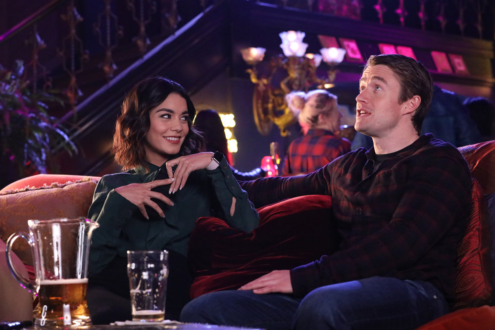 POWERLESS -- "Emily Dates A Henchman" Episode 107 -- Pictured: (l-r) Vanessa Hudgens as Emily, Robert Buckley as Dan -- (Photo by: Evans Vestal Ward/NBC)