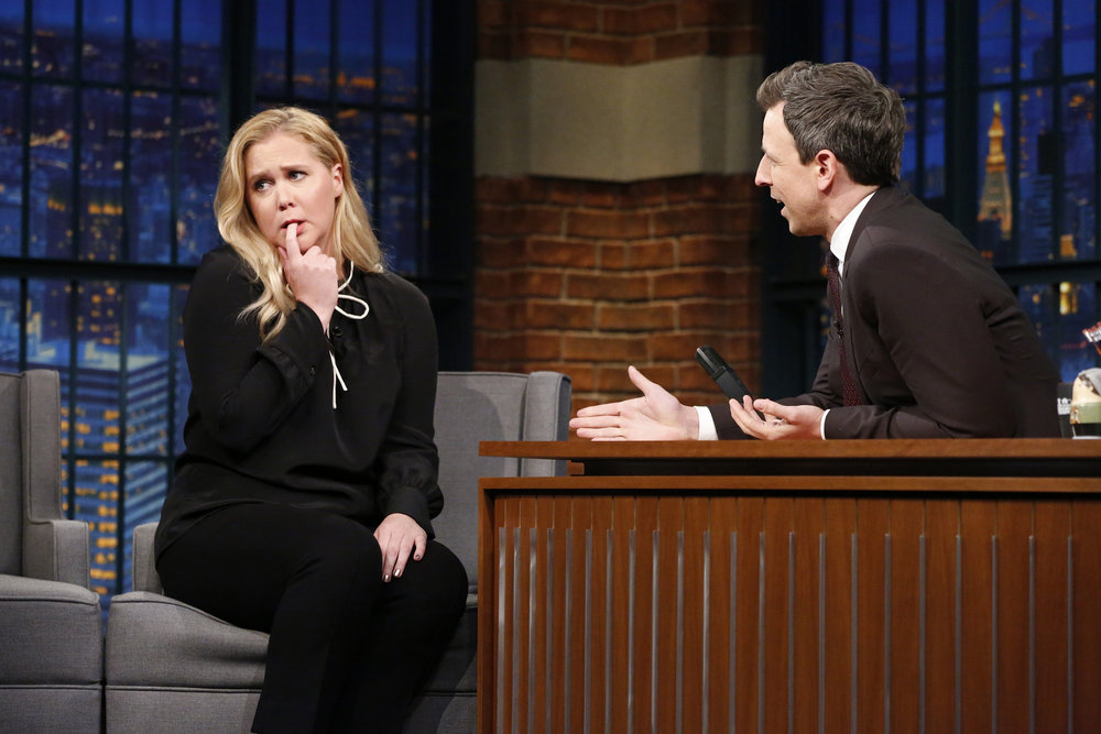 LATE NIGHT WITH SETH MEYERS -- Episode 498 -- Pictured: (l-r) Comedian Amy Schumer during an interview with host Seth Meyers on March 1, 2017 -- (Photo by: Lloyd Bishop/NBC)