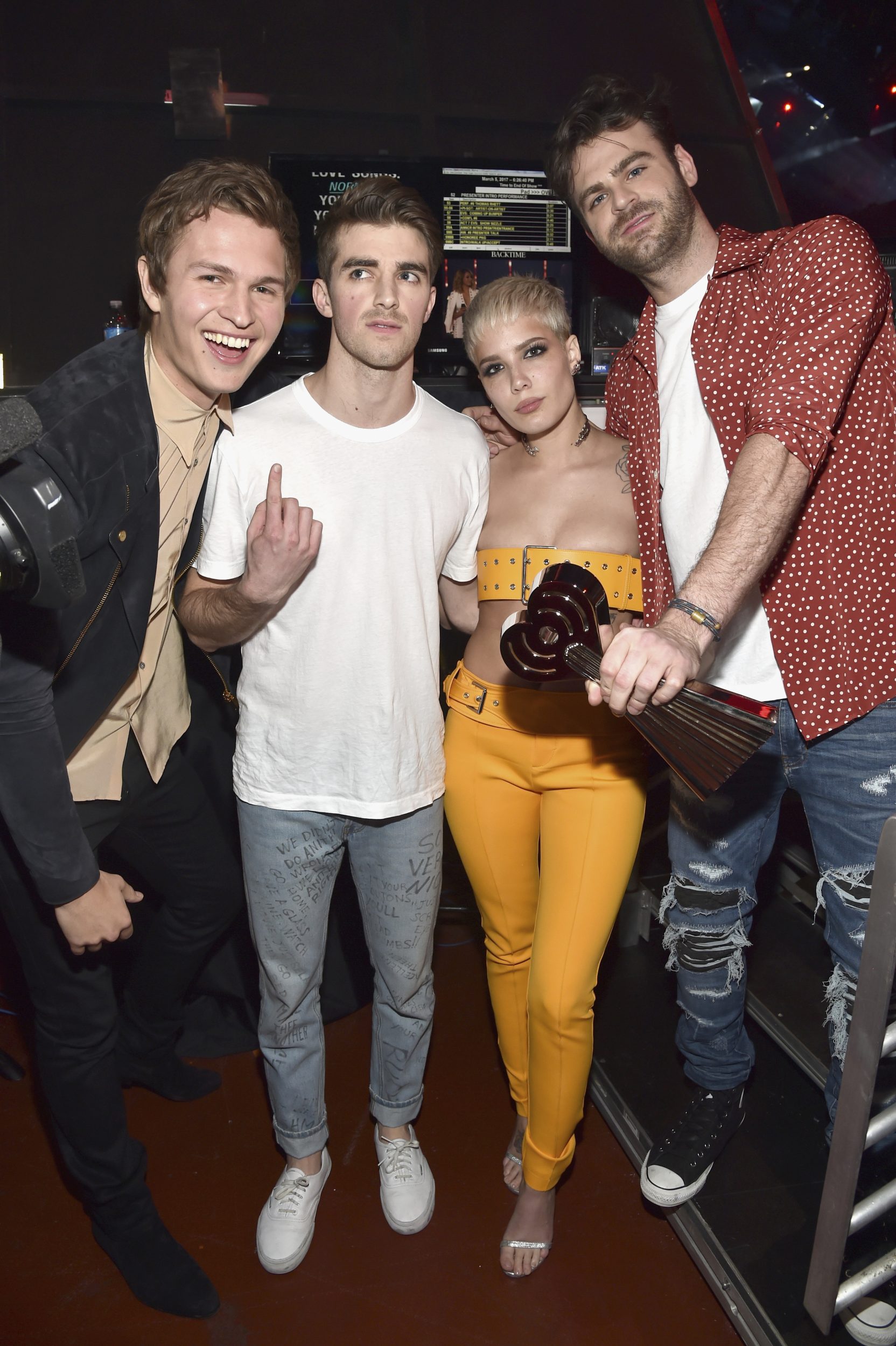 INGLEWOOD, CA - MARCH 05: Actor Ansel Elgort (L) poses backstage with DJs Drew Taggart (2nd L) and Alex Pall (R) of The Chainsmokers and singer Halsey (2nd R), winners of Dance Song of the Year for 'Closer,' at the 2017 iHeartRadio Music Awards which broadcast live on Turner's TBS, TNT, and truTV at The Forum on March 5, 2017 in Inglewood, California. (Photo by Frazer Harrison/Getty Images for iHeartMedia) *** Local Caption *** Ansel Elgort; Drew Taggart; Alex Pall; Halsey