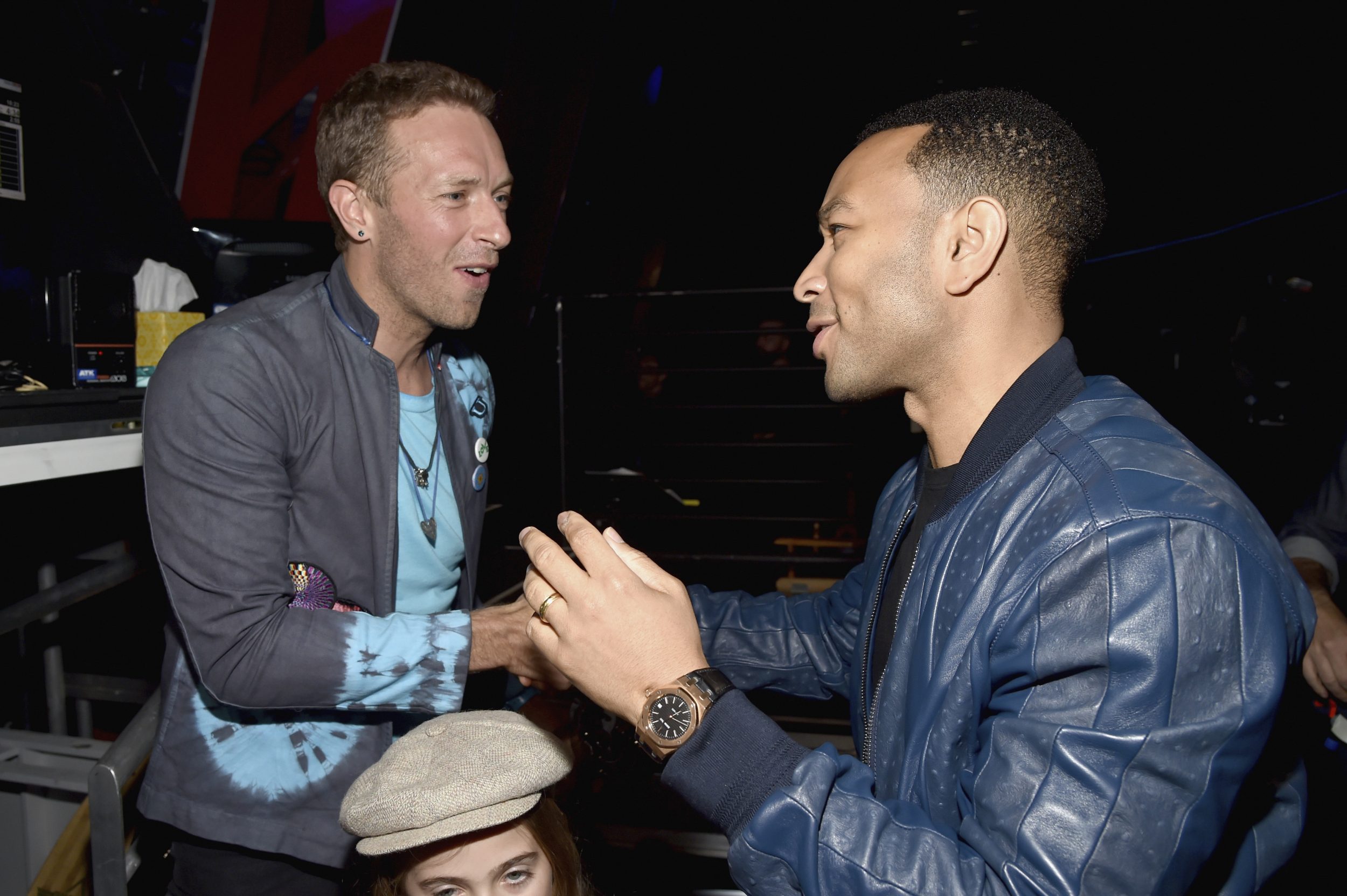INGLEWOOD, CA - MARCH 05: Musicians Chris Martin (L) and John Legend speak backstage at the 2017 iHeartRadio Music Awards which broadcast live on Turner's TBS, TNT, and truTV at The Forum on March 5, 2017 in Inglewood, California. (Photo by Frazer Harrison/Getty Images for iHeartMedia) *** Local Caption *** Chris Martin; John Legend