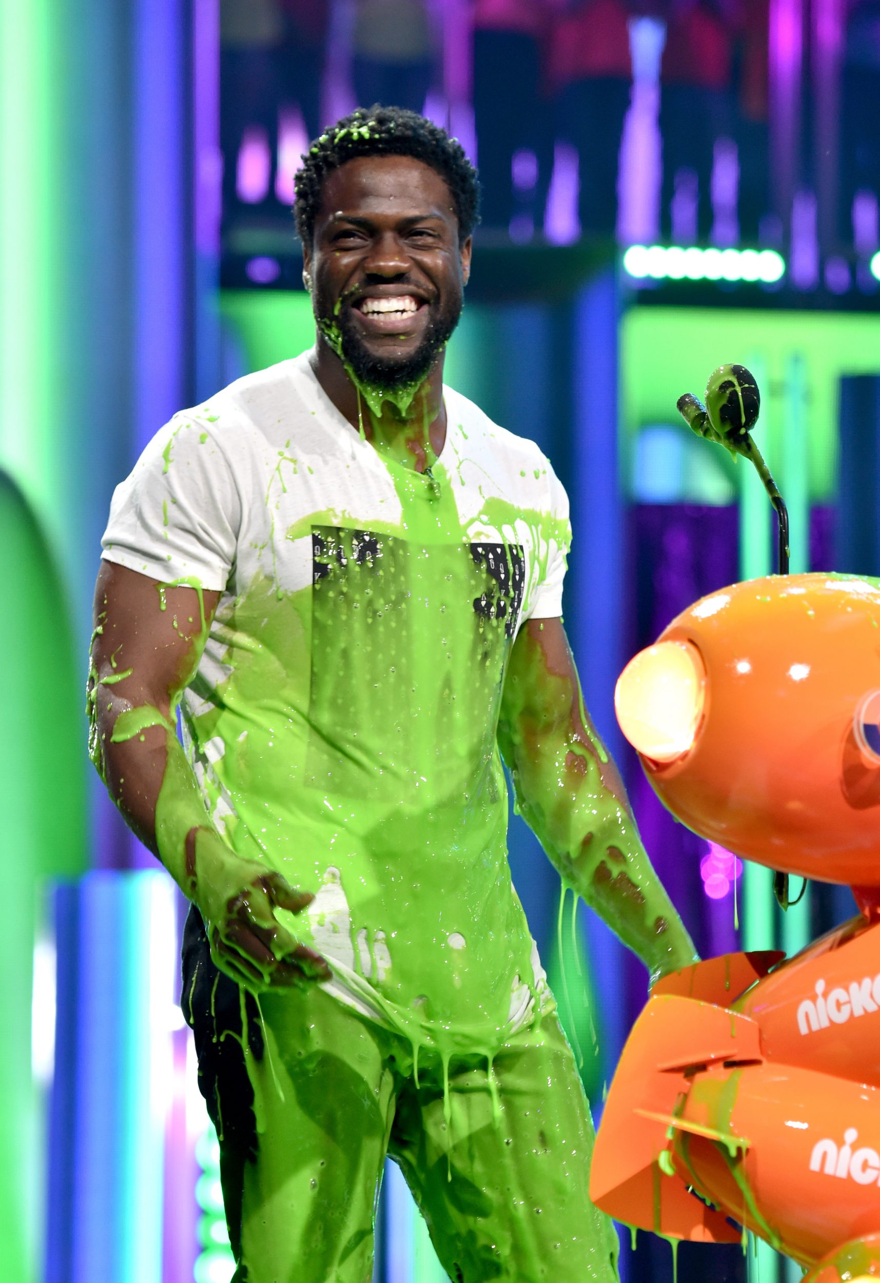 LOS ANGELES, CA - MARCH 11:  Actor Kevin Hart gets slimed onstage at Nickelodeon's 2017 Kids' Choice Awards at USC Galen Center on March 11, 2017 in Los Angeles, California.  (Photo by Frazer Harrison/KCA2017/Getty Images for Nickelodeon - Issued to Media by Nickelodeon)