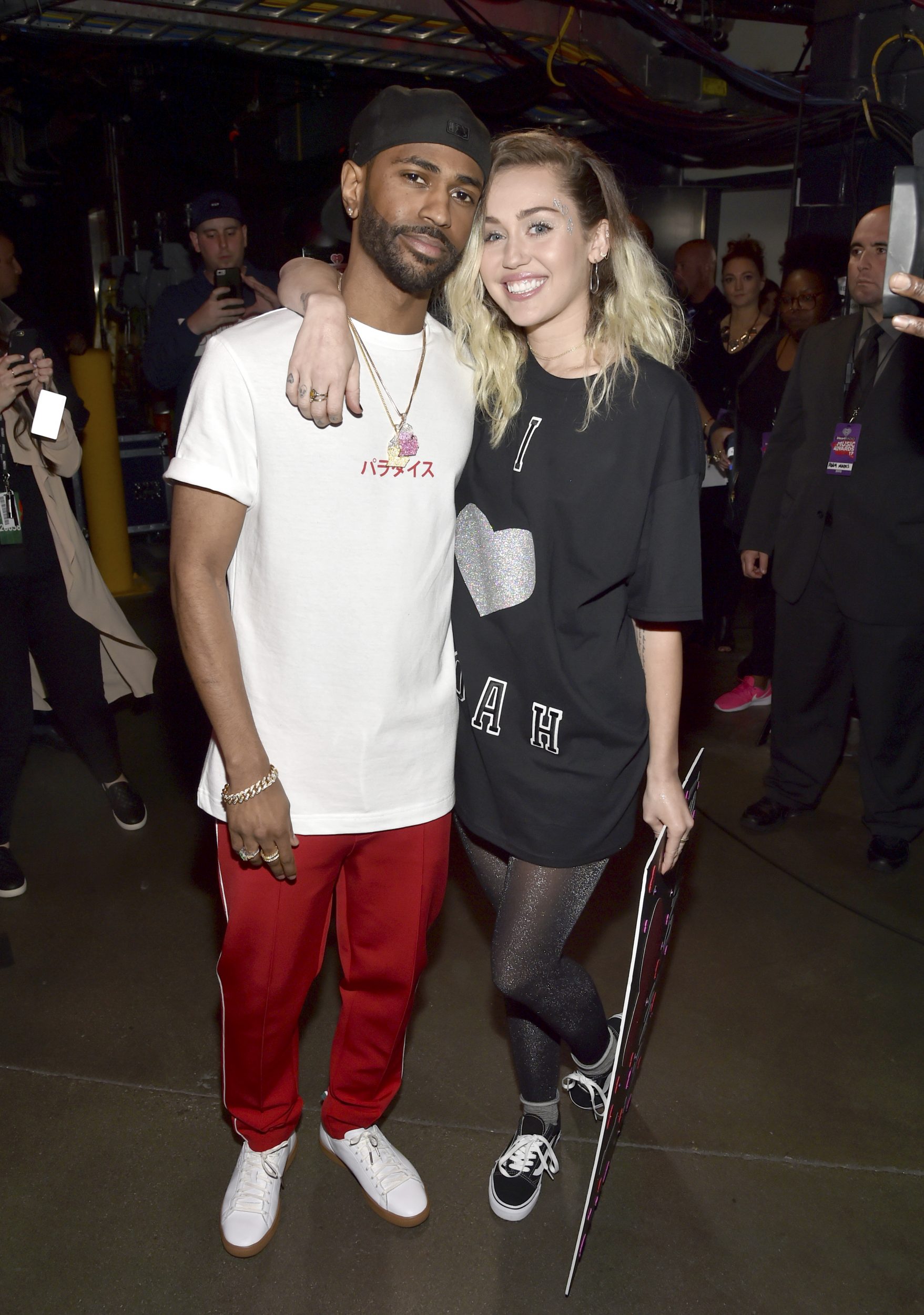 INGLEWOOD, CA - MARCH 05: Musicians Big Sean (L) and Miley Cyrus backstage at the 2017 iHeartRadio Music Awards which broadcast live on Turner's TBS, TNT, and truTV at The Forum on March 5, 2017 in Inglewood, California. (Photo by Frazer Harrison/Getty Images for iHeartMedia) *** Local Caption *** Big Sean; Miley Cyrus