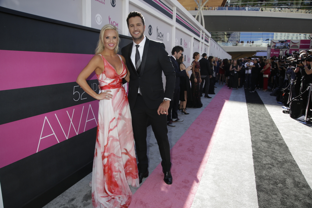 Luke Bryan and wife Caroline on the red carpet at THE 52ND ACADEMY OF COUNTRY MUSIC AWARDS®, broadcast LIVE from T-Mobile Arena in Las Vegas Sunday, April 2 (live 8:00-11:00 PM, ET/delayed PT) on the CBS Television Network. Photo: Francis Specker/CBS ©2017 CBS Broadcasting, Inc. All Rights Reserved