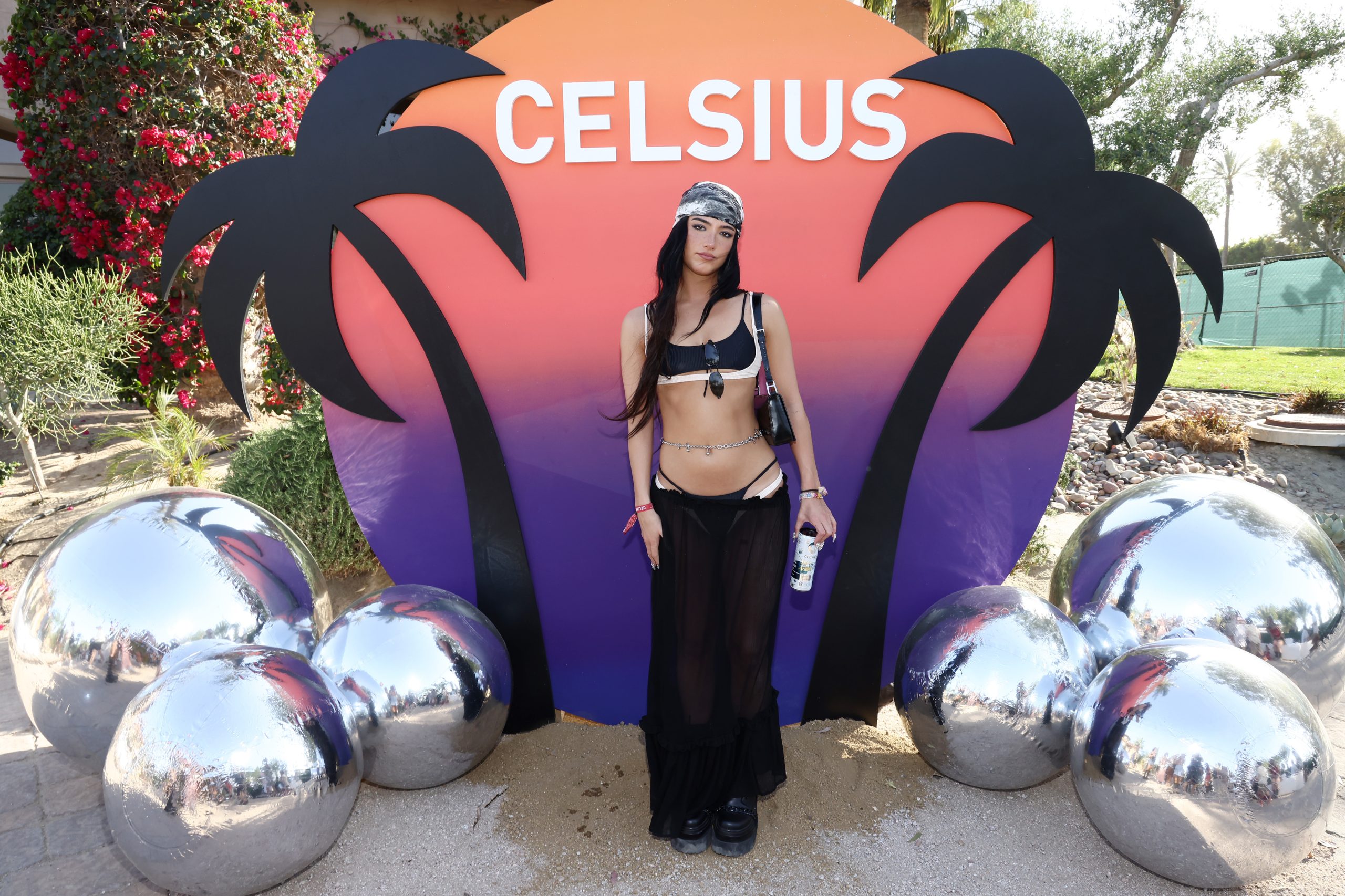 Charli D'Amelio Brings Killer Coachella Look To Celsius Energy's Cosmic  Desert Party
